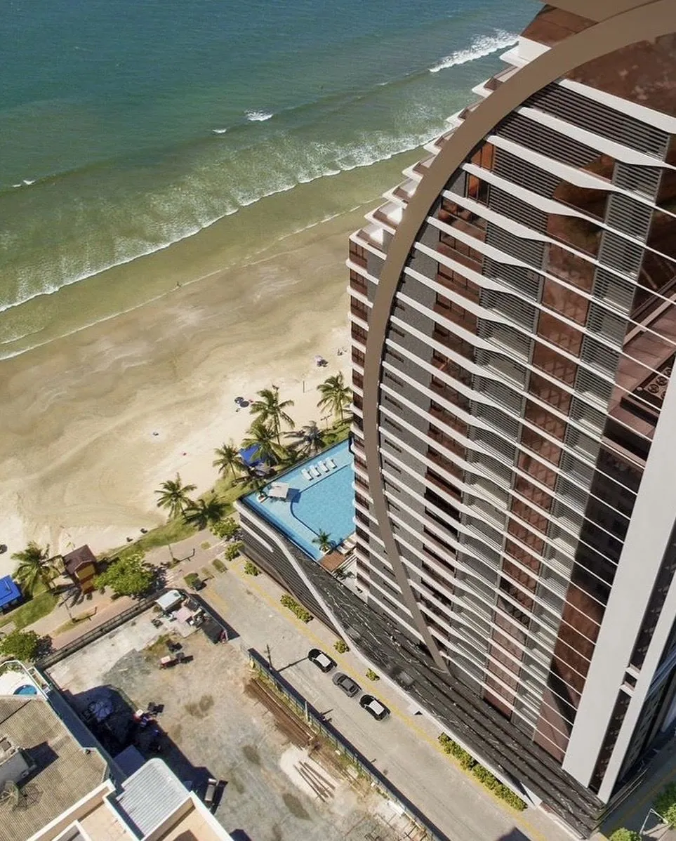 Apartamento frente mar alto padrão na planta